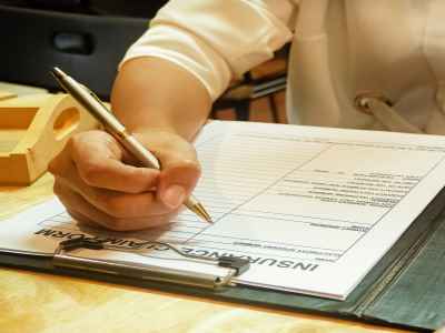 filling out insurance clams process forms